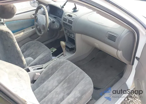 1998 Toyota Corolla Le from USA, damaged, VIN 2T1BR12E8WC031833